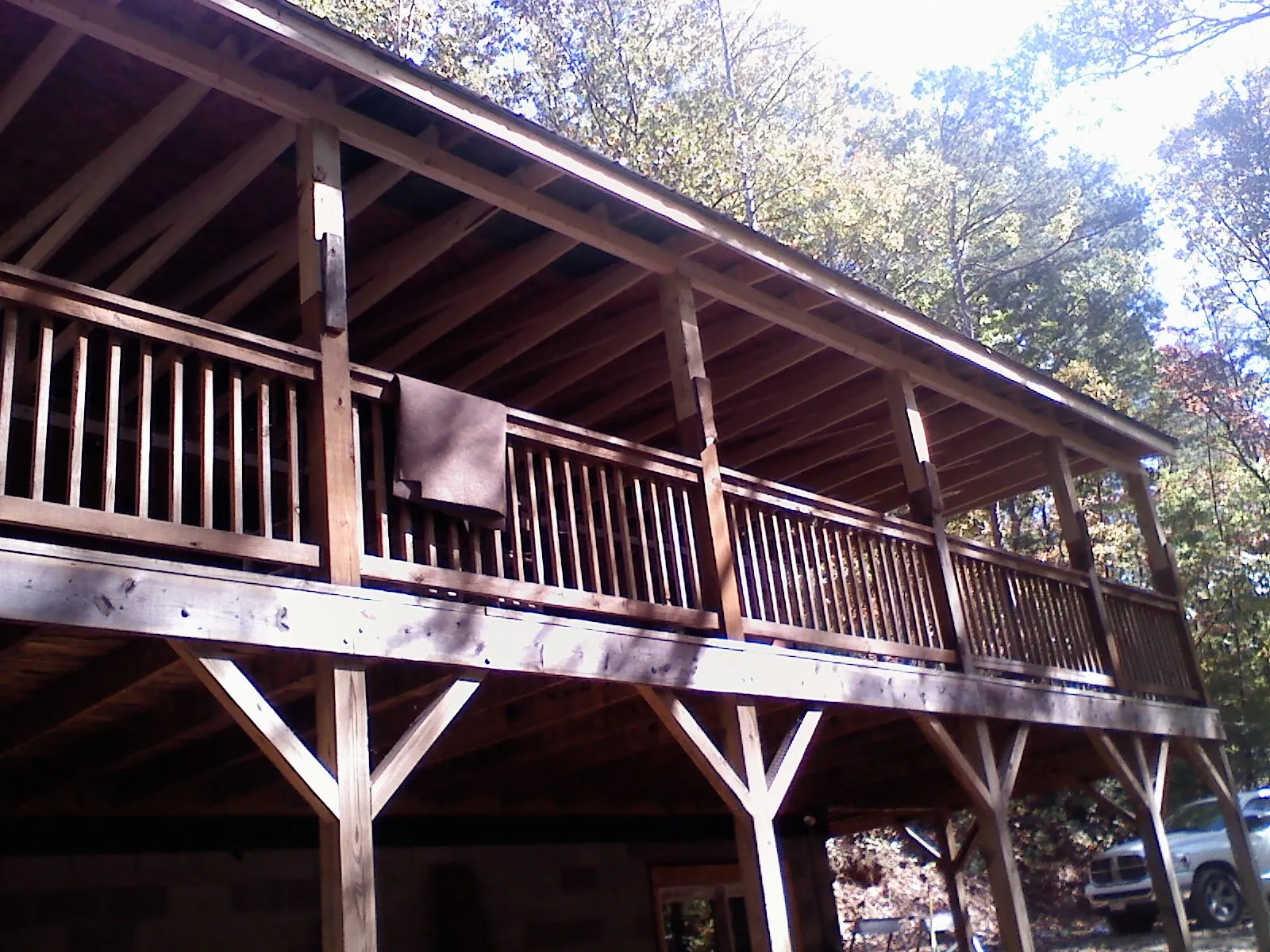 Timber framing under a new elevated porch and deck — Roof Leak Repair in Sauk City by Roofing Brothers